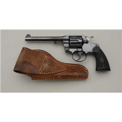 Colt Official Police .38 spc.  DA revolver  with 6” barrel and rubber grips. SN:474581.  75% to 85% 