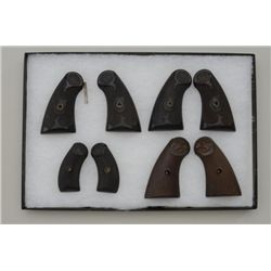 Lot of 4 pair of Colt checkered hard rubber  grips in riker case including a pair of New  Army Civil