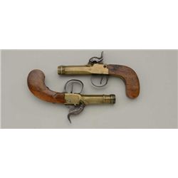 Near pair of Belgian-proofed single shot  percussion cannon barreled single shot  muff-sized pistols