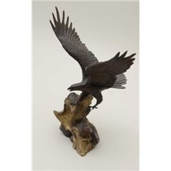 Small beautifully detailed bronze flying bald  eagle entitled “Wings of Glory” by Ronald  Van Ruycke