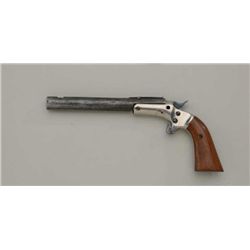 Stevens tip-up single shot pistol, .22 cal.,  6” heavy round barrel, nickel finish to  frame, wood g