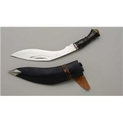 Gherka knife with sheath and two small side  knives from India in overall good condition  approx. 17