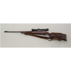 Belgian-made FN bolt-action rifle, .30-06  cal., 24” barrel, blue finish, checkered wood  stock, lea