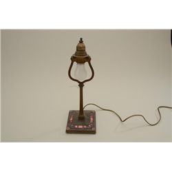 Lamp signed Louis Tiffany Furnaces Inc. #369,  Glass inlaid base measures approximately 14”  in heig