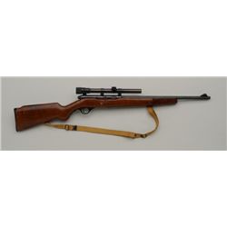 Mossberg Model 152 .22 semi auto rifle with  scope. Good to very good condition. Est.  $75-$150.