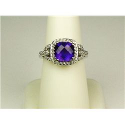 Glittering 10 karat white gold ladies ring  set with a checkerboard cut Amethyst weighing  approx. 3