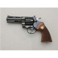 Colt Python DA revolver, .357 Magnum cal., 4”  ventilated rib barrel, blue finish,  checkered wood m