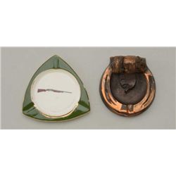 Lot of 2 ashtrays including a porcelain tray  with Model 12 Winchester shotgun and a bronze  tray wi