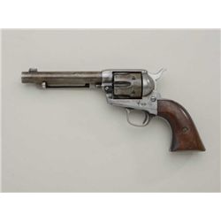 Colt SAA revolver, .32 WCF cal., 5-1/2”  barrel, blue finish, replaced wood grips,  #165202 (circa 1