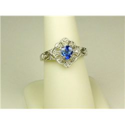 Gorgeous 14 karat white gold ladies vintage  design ring set with a fine Ceylon type color  sapphire