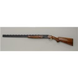 SKB Model 500 O/U shotgun, .410 gauge, 28”  ventilated rib barrels, blue finish,  checkered wood sto