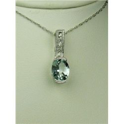Stylish 14 karat white gold ladies vintage  design necklace set with an oval Aquamarine  weighing ap