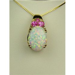 Elegant 14 karat yellow gold ladies pendant  set with a large opal weighing approx. 8.00  carats and