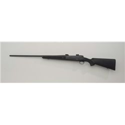 Winchester Model 70 bolt-action rifle, 7mm  Rem. Mag. cal., 26” barrel, mat black finish,   checkere
