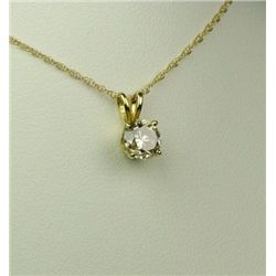 Brilliant 14 karat yellow gold ladies pendant  set with a round brilliant cut diamond  weighing appr