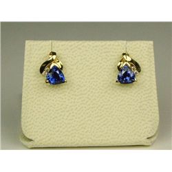 Exquisite 14 karat yellow gold ladies  earrings set with two fine blue trilliant cut  Tanzanites wei