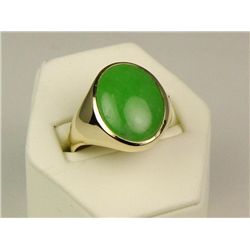 Dynamic 14 karat heavy yellow gold gents ring  bezel set with a nice color green Jade  weighing appr
