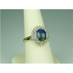 Exquisite 10 karat yellow gold ladies ring  set with an Australian black opal weighing  approx. 1.50