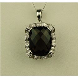 Gorgeous 10 karat white gold ladies pendant  set with a large checkerboard cut smoky Topaz  weighing