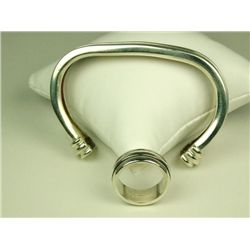 Fashionable ladies sterling silver ‘TIFFANY’  bangle and ring weighing over 57 grams.  Estimate $400