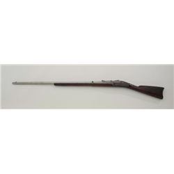Parts gun consisting of a U.S. Springfield  trapdoor barrel and receiver only with  shortened wood s