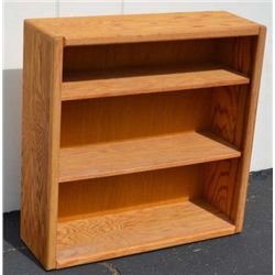 Oak bookcase with two adjustable oak shelves,  approx. 36” high, 36” wide and 12” deep in  overall f