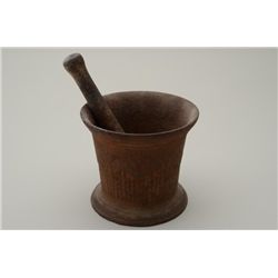 Antique cast iron assayer’s mortar and  pestle, approx. 6” in height and approx. 7”  in diameter wit