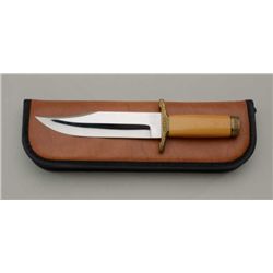 Custom clip point bowie knife, approx. 12”  overall with a 7” blade marked “JM” with  engraved brass
