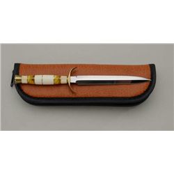 Custom knife by Dawson, approx. 10” overall  with a 6” blade, like new and nicely  constructed.  Est