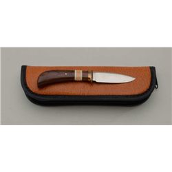Custom skinning knife by Schroen in fine  condition approx. 8” overall with a 3-1/2”  blade; exotic 