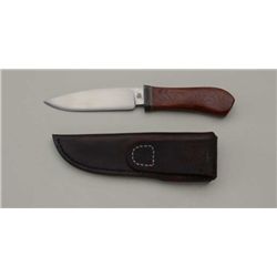 Custom belt knife with leather sheath in like  new condition approx. 9” overall with a  4-1/2” blade