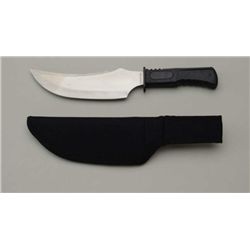 Skagway Skinner knife with sheath in like new  condition.  Est.:  $50-$100.