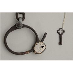 Lovell handcuffs with key in overall good  condition showing muted nickel on both  lockplates, scarc