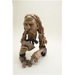 Nicely detailed bronze of Wild Bill Hickok  playing cards with Aces and Eights, approx.  14” in heig