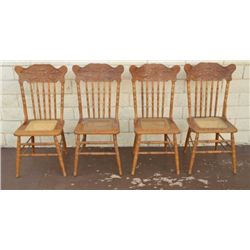 Lot of 4 matching oak press back “North Wind”  style chairs with sheet caned seat inserts,  made cir