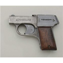 Mossberg Brownie Model four shot derringer,  .22 cal., 2-1/2” barrels, blue finish, wood  grips, #22