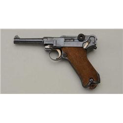 German commercial Luger semi-auto pistol by  DWM, .30 cal., #5754i, blue finish, checkered  wood gri