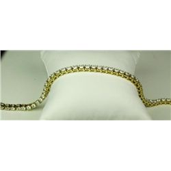 Dazzling 14 karat yellow gold ladies tennis  bracelet set with 46 round brilliant cut  diamonds weig