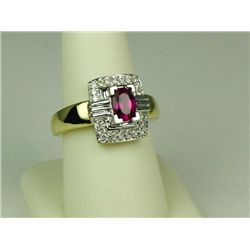 Very high quality 18 karat two-tone gold  ladies ring set with a fine quality ruby  weighing approx.