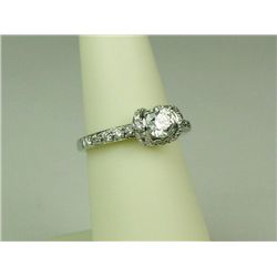 Exquisite 14 karat white gold ladies ‘HALO’  design ring set with a round ‘IDEAL’ cut  diamond weigh