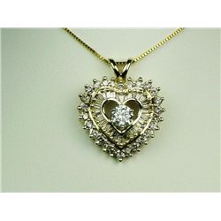 Stunning 10 karat yellow gold ladies heart  design necklace with a center round diamond  weighing ap