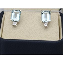 Exquisite 14 karat white gold ladies handmade  earrings set with two matching Aquamarines  weighing 