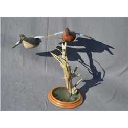 Handcarved flying ducks and mixed-media  artwork signed Happ. Approximate 23 inches in  height by 28