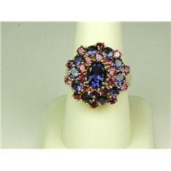 Colorful 10 karat yellow gold ladies ring set  with a combination of Tanzanite and pink  Tourmalines