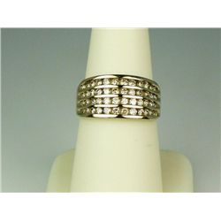 Trendy 10 karat yellow gold ladies ring  channel set with 48 round brilliant cut  diamonds weighing 