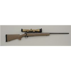 Howa Model 1500 bolt action rifle, .338 Win.  Magnum cal., blue finish, composite stock,  #B072011 m