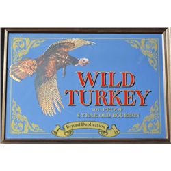 Advertising mirror for wild Turkey Bourbon  measures approximately 22.5” x 32” Estimate  $100-$200.