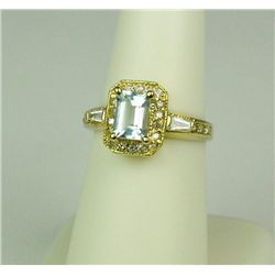 Gorgeous 14 karat yellow gold ladies ring set  with a fine Aquamarine weighing approx. 1.20  carats 