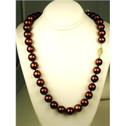 Marvelous ladies18 inch strand of round  chocolate cultured pearls averaging  9.00-10.00 MM in diame
