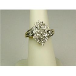 Dazzling 10 karat yellow gold ladies ring set  with round and baguette cut diamonds  weighing approx